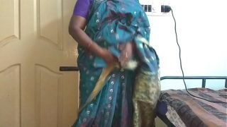 desi indian tamil telugu kannada malayalam hindi horny cheating wife vanitha wearing blue colour saree showing big boobs and shaved pussy press hard boobs press nip rubbing pussy masturbation Video